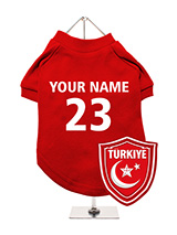 Turkey Football Dog T-Shirt (Personalised) - Support Trkiye with this personalised dog t-shirt, featuring a unique Trkiye crest with a crescent moon. You can add your dog's name and team number for a custom touch. Made from soft and cosy fabric, it ensures your dogs comfort. It's simple to clean, being machine washable. Perfect for flauntin...